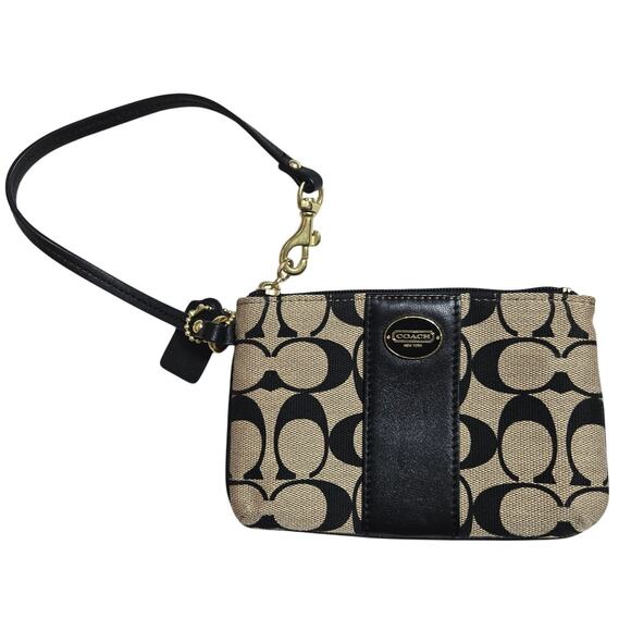 Coach Handbags - Coach Signature Black Beige Wristlet Excellent condition #863